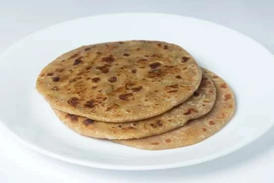 Indian stuffed parathas on a plate